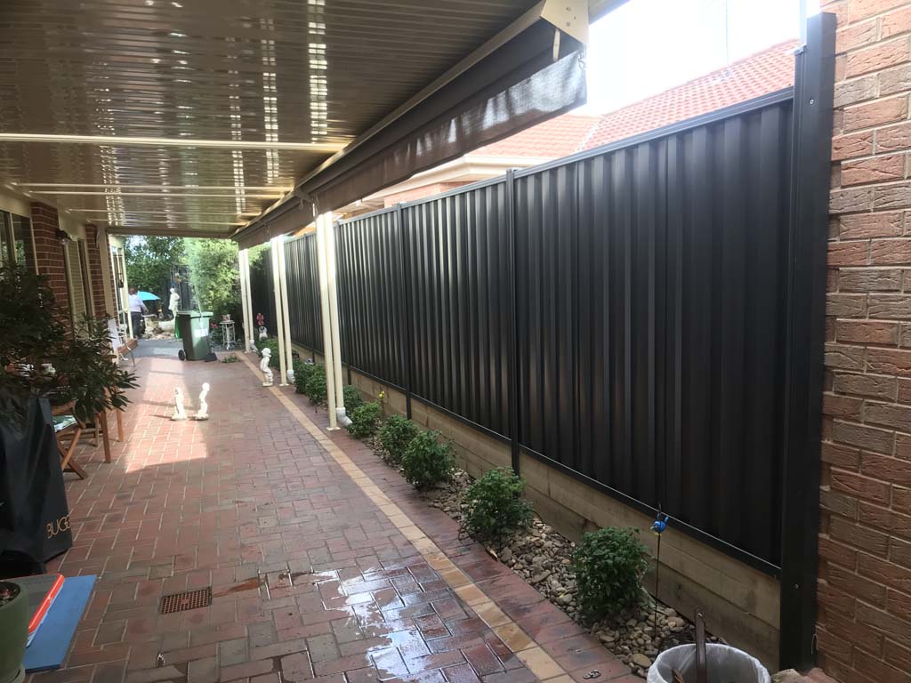 Colorbond fence pine sleepers monument Gowanbrae