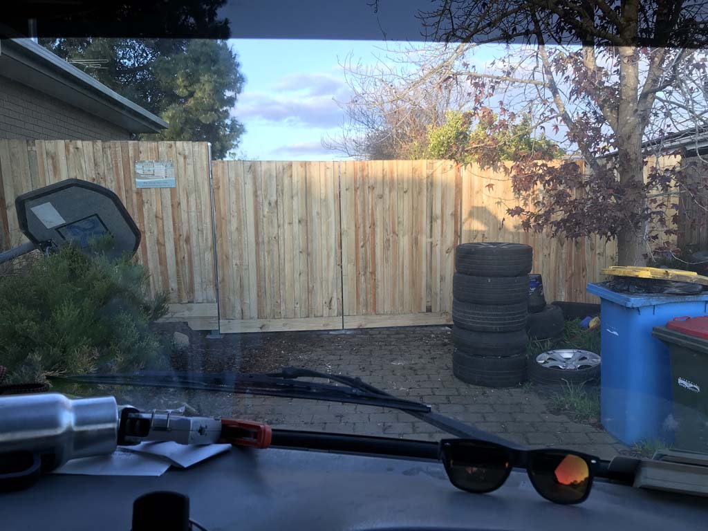 Paling fence with double gates wallan
