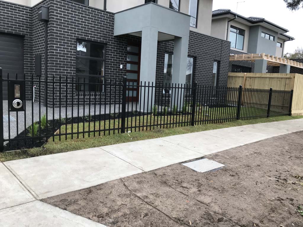 Rod top front fence with letterbox
